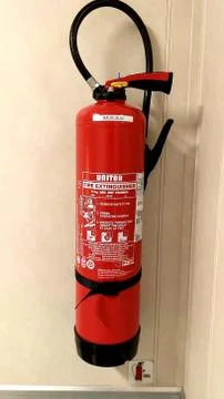 Red fire extinguisher Stock Photos