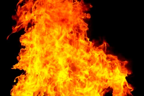 Red fire flame on black background Stock Photos