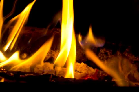 Red fire flame on black background Stock Photos