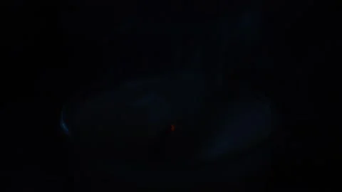 Red fire flame blown out in a black background Stock-Footage 197796075