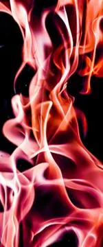 Red fire flames as nature element and abstract background Stock Photos