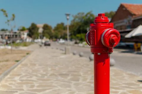 Red fire hydrant on blurred background Stock Photos