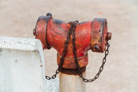 Red fire hydrant with chain Stock Photos