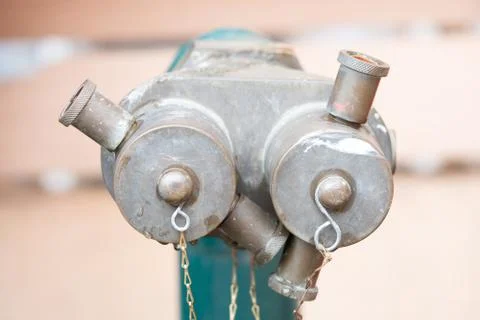 Red fire hydrant on a sidewalk Stock Photos