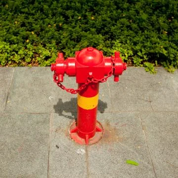 Red fire hydrant on the street Foto stock