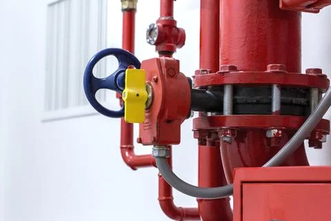Red Fire Hydrant System or Industrial fire control system Extinguishers Stock Photos