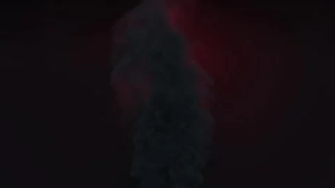 Red fire rapidly circles around a plume of smoke against a black background Stock Footage 193312442