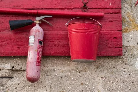 Red fire shield on a stone wall Stock Photos