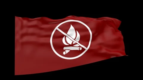 Red fire warning flag over black background 3d animation Stock Footage 99105295