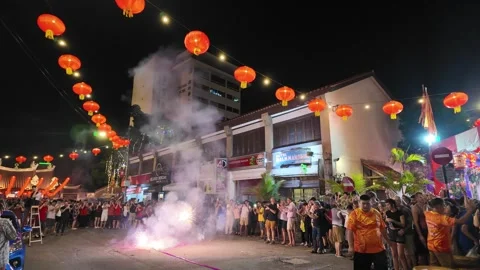 Red firecrackers bring luck and joy during celebration. 스톡 동영상 318091117