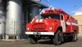Red firetruck in fire department HD Footage