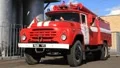 Red firetruck in fire department HD Footage