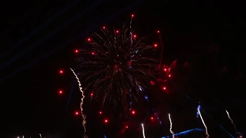 Red Firework Starburst With Glowing Trails in Night Sky Stock Footage 343624732