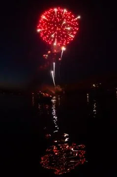 Red Fireworks and Reflection 写真素材