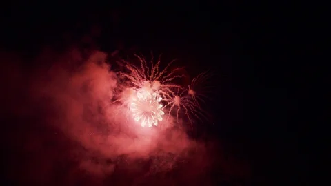 Red Fireworks Display Explosion at dark Sky in 6k Stock Footage 95724045