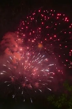 Red fireworks exploding. Stock Photos
