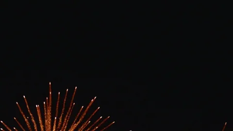 Red Fireworks Exploding with Small Trails Shooting By SLOW MOTION 動画素材 107277272