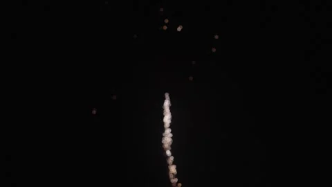 Red fireworks explosion lighting night sky in celebration 스톡 동영상 330992741