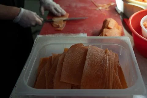 Red fish close-up on the background the chef prepares seafood. Stock Photos