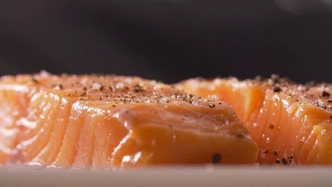 Red fish is cooked by a cook Stock Footage 83346307