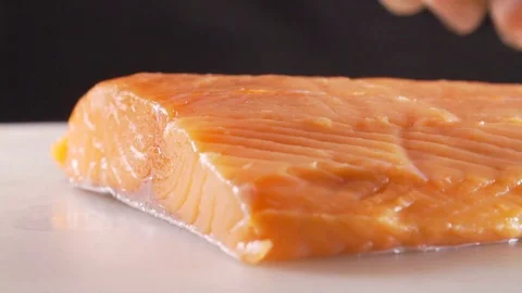 Red fish is cooked by a cook Stock Footage 83346310