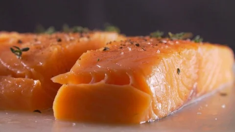 Red fish is cooked by a cook Stock Footage 83346389