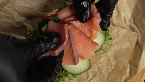 Red fish on cucumbers Stock Footage 297004260