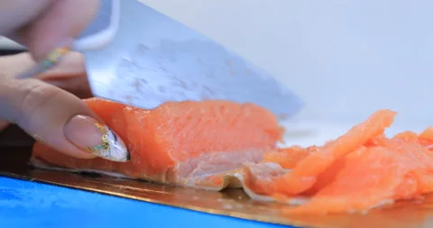 Red fish cut with a knife 스톡 동영상 145934612