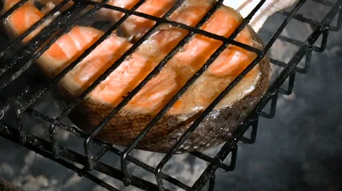 Red fish is fried on coals Stock Footage 68350226