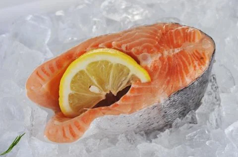 Red fish on ice Stock Photos