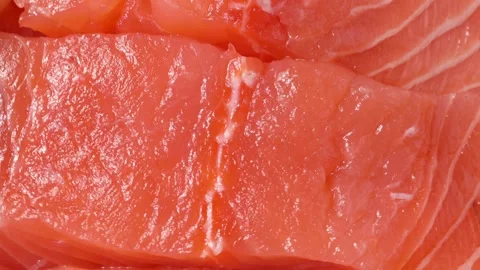 Red fish slices, rotation in circle. salmon slices Turning. Stock Footage 241924535