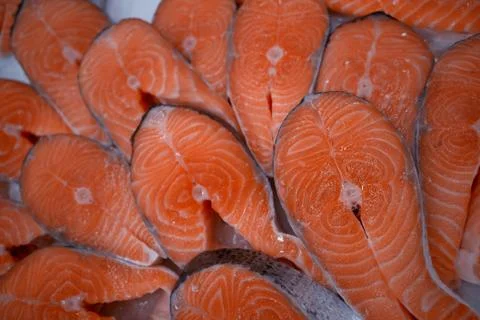 Red fish steaks texture background Foto stock