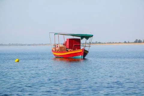 The red fishing boat a break between fishing. Stock Photos