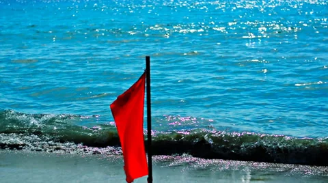 Red flag on the background of the calm sea Video stock 36580943