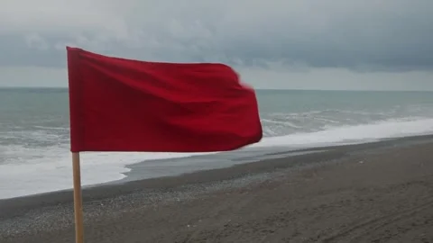 A red flag. The ban on bathing. Big waves. The danger of swimming Stock Footage 278275418