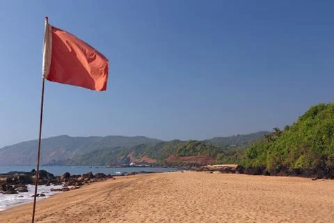 Red flag on the beach Stock Photos