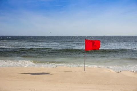 Red flag at the beach Stock Photos