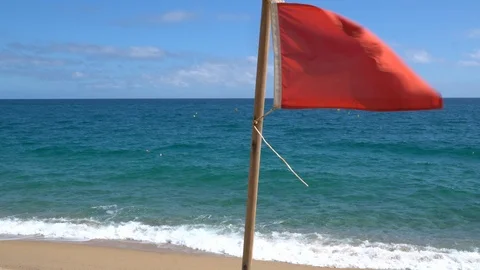Red flag on the beach warned of the danger. No swimming in the sea, ocean - no l Stock-Footage 113101410