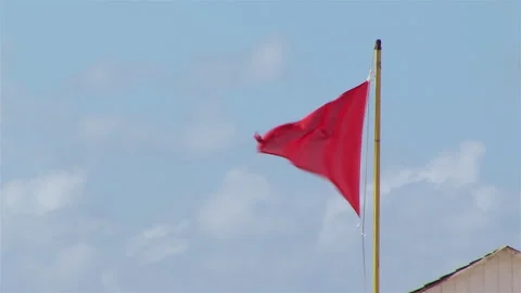 A Red Flag on Beach, Warning Sign, Dangerous Swim, High Hazard, Strong Currents. 스톡 동영상 263973395