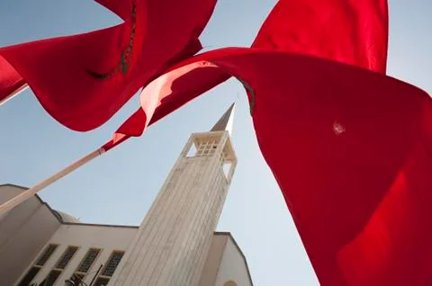 Red flag flutters in the wind Stock Photos