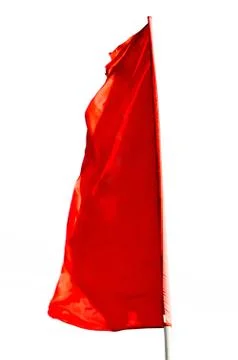 Red flag long vertical shape isolated on white background. Fotos Stock
