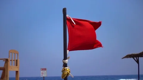 Red flag over blue sky slow motion, 240 fps (8x), hd 1080p video footage Stock Footage 84171797