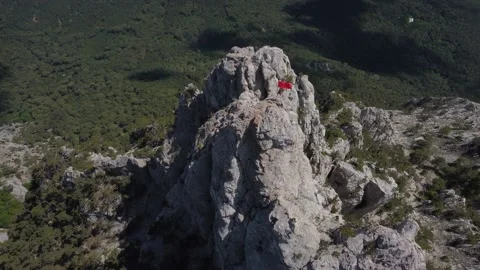 Red flag on the peak of Mount Ai Petri in Crimea Stock-Footage 155450865