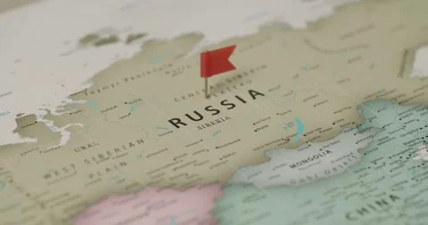Red flag pin marking Russia on a world map Stock Footage 345588742