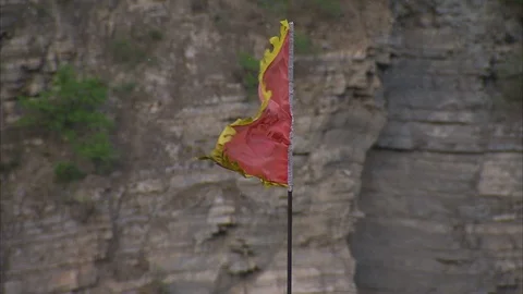 Red Flag swaying in wind at The Great Wall of China Stock Footage 88728398