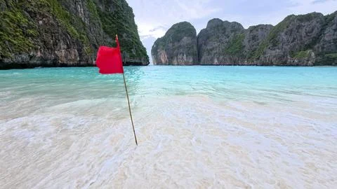 Red flag for warning at the beach Stock Photos
