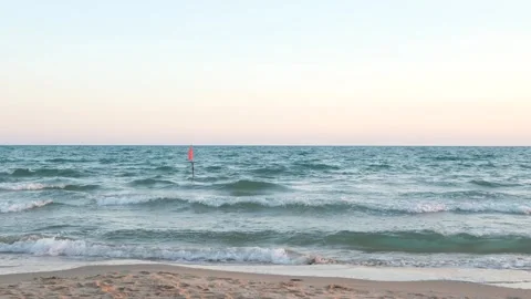 Red flag warning at the sea with high tide waves. Stock Footage 276350308
