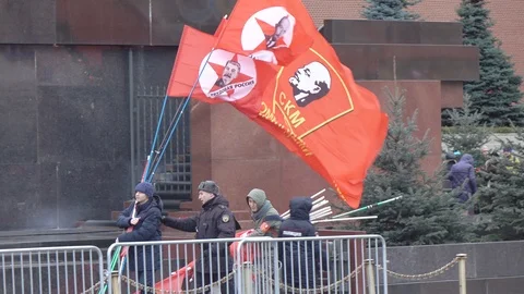 Red flags and an image of Lenin and Stalin Video stock 121804884