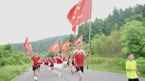 Red flags and young runner Stock Footage 341739126