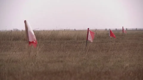 Red flags on runway at airport Stock Footage 59602147